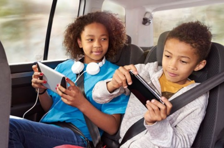 What age can a child sit in the online front seat of a car with an